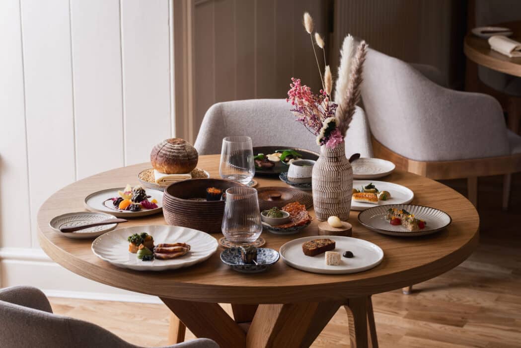 a restaurant with tables and chairs